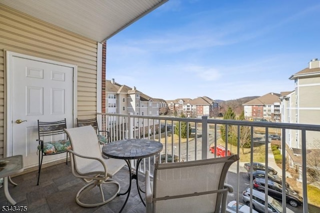 balcony featuring a residential view