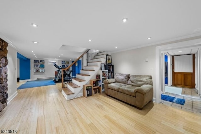 living area featuring stairs, recessed lighting, light wood-style floors, and ornamental molding