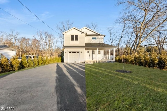 view of front of property featuring aphalt driveway, a garage, a porch, and a front lawn