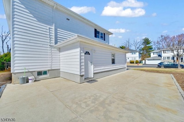 rear view of house with a patio