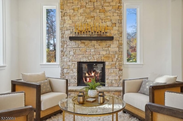 sitting room with a fireplace