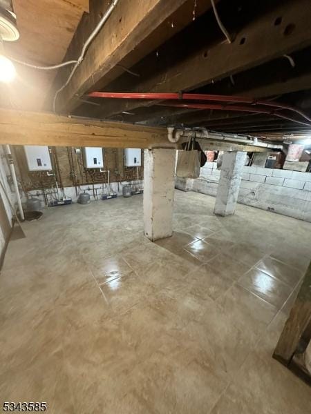 unfinished basement with electric panel