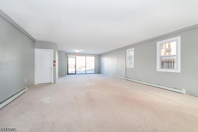 empty room with a baseboard heating unit