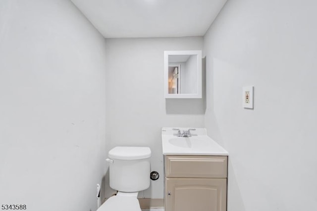 half bath with toilet and vanity