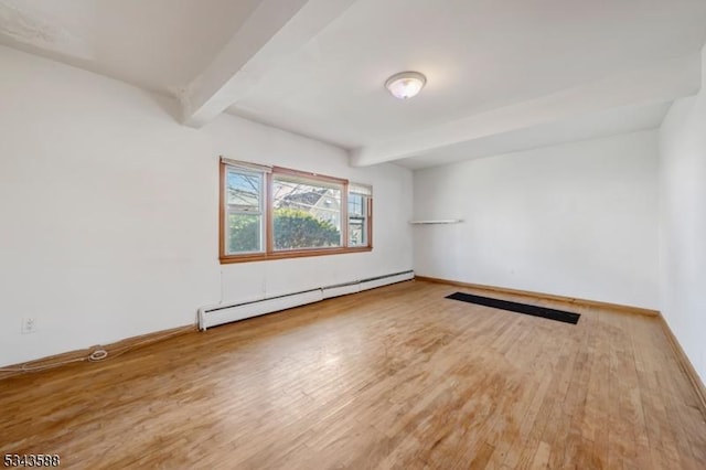 empty room with beam ceiling, wood finished floors, baseboards, and baseboard heating