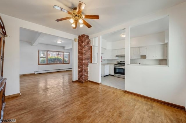 unfurnished living room with baseboards, ceiling fan, light wood-style floors, a baseboard heating unit, and beamed ceiling