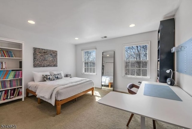 bedroom with recessed lighting, visible vents, carpet floors, and baseboards