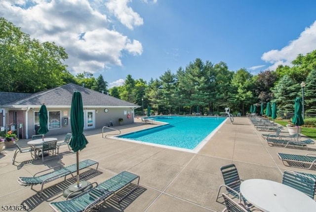 pool featuring a patio area