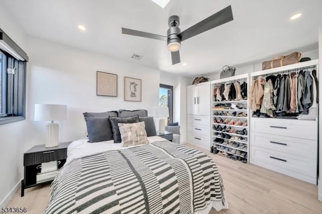 bedroom featuring recessed lighting, visible vents, light wood-style floors, and ceiling fan