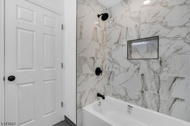 full bathroom with shower / washtub combination