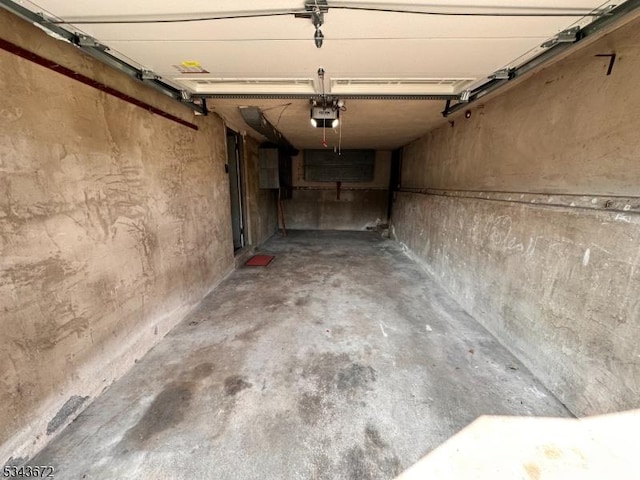 131 Beverly Rd, Bloomfield Twp, NJ 07003 - garage featuring a garage door opener