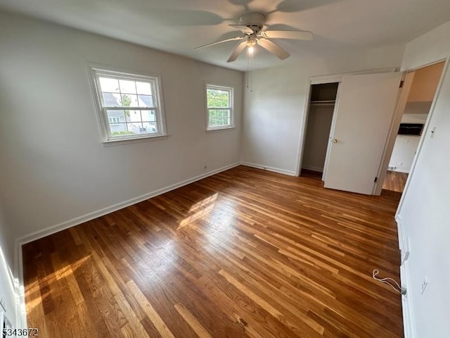 131 Beverly Rd, Bloomfield Twp, NJ 07003 - unfurnished bedroom featuring wood finished floors, a closet, baseboards, and ceiling fan
