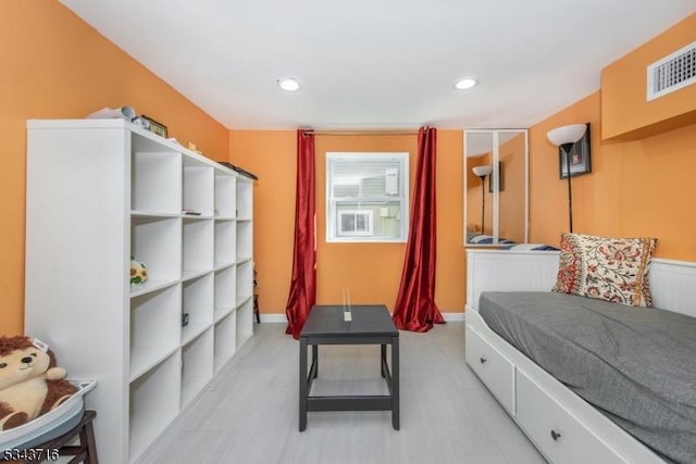 bedroom with recessed lighting, visible vents, and baseboards