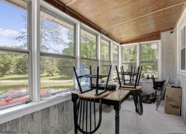 sunroom / solarium with wooden ceiling and vaulted ceiling