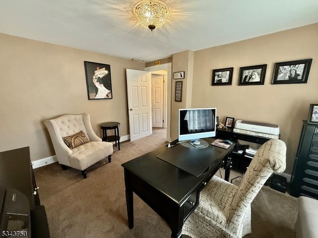 office featuring baseboards and carpet floors