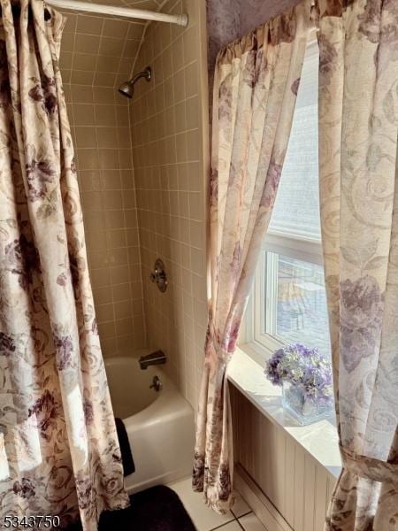 bathroom featuring shower / bath combination with curtain