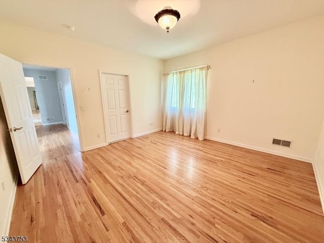 20 Tonnelier Way, Denville Twp, NJ 07834 - unfurnished room with light wood-style floors and baseboards