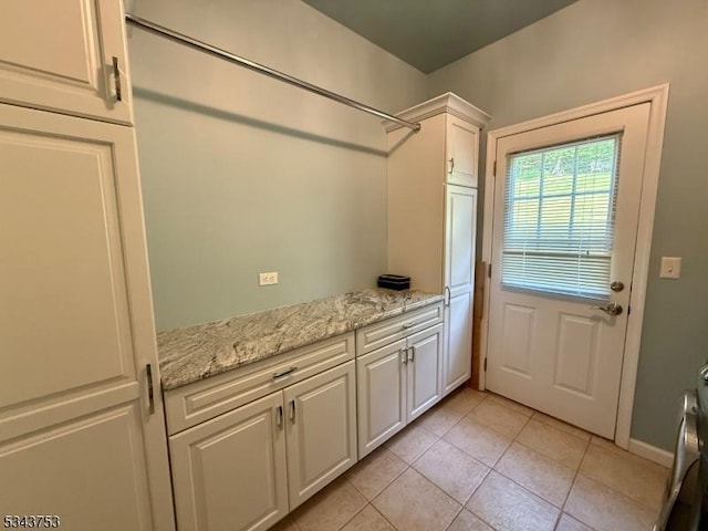 20 Tonnelier Way, Denville Twp, NJ 07834 - laundry area featuring cabinet space and light tile patterned flooring