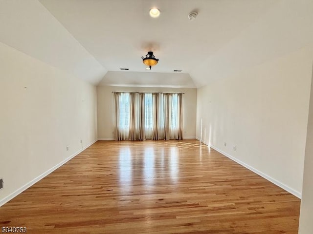 20 Tonnelier Way, Denville Twp, NJ 07834 - spare room featuring light wood-type flooring, lofted ceiling, and a smoke detector
