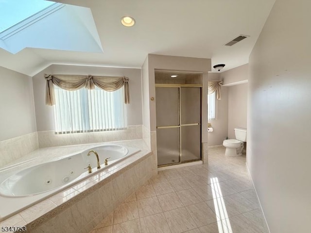 20 Tonnelier Way, Denville Twp, NJ 07834 - full bathroom featuring a jetted tub, a stall shower, tile patterned floors, and a skylight