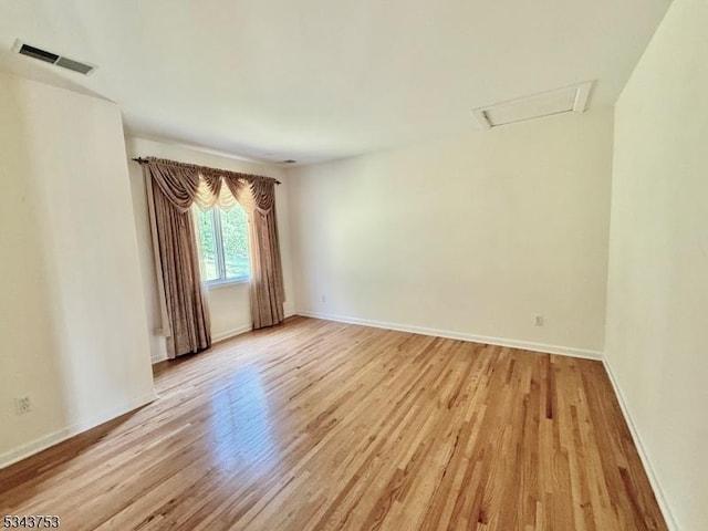 20 Tonnelier Way, Denville Twp, NJ 07834 - unfurnished room featuring light wood-type flooring and attic access