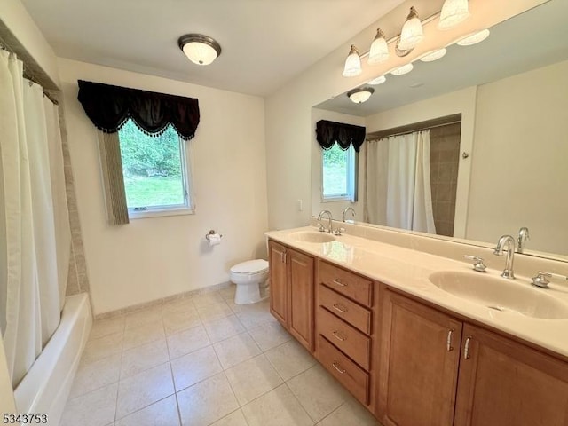 20 Tonnelier Way, Denville Twp, NJ 07834 - bathroom with healthy amount of natural light, double vanity, tile patterned floors, and shower / bath combo with shower curtain