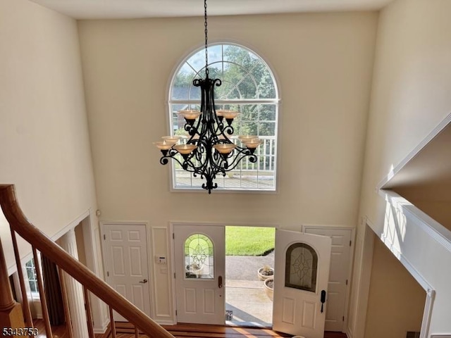 20 Tonnelier Way, Denville Twp, NJ 07834 - entrance foyer featuring a chandelier, a towering ceiling, and plenty of natural light