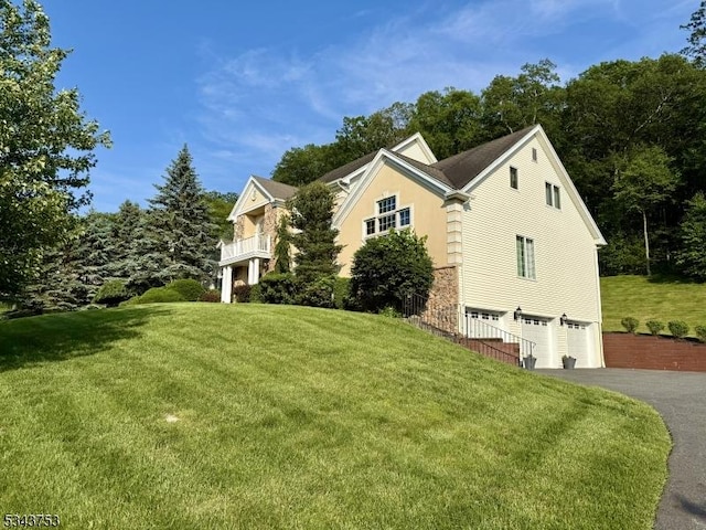 20 Tonnelier Way, Denville Twp, NJ 07834 - view of front of home featuring a garage, driveway, and a front lawn