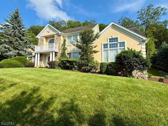 20 Tonnelier Way, Denville Twp, NJ 07834 - colonial inspired home featuring stucco siding, a front yard, and a balcony