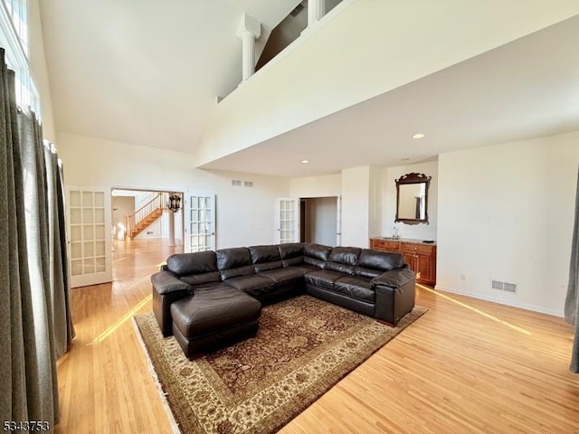 20 Tonnelier Way, Denville Twp, NJ 07834 - living room featuring light wood-style floors, stairs, and a high ceiling