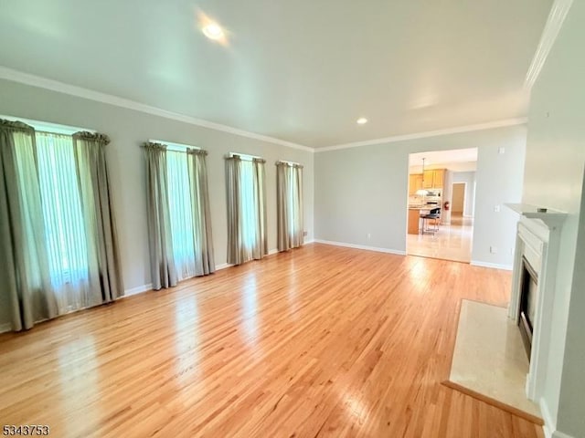 20 Tonnelier Way, Denville Twp, NJ 07834 - unfurnished living room with light wood-style floors, ornamental molding, a fireplace with flush hearth, and recessed lighting