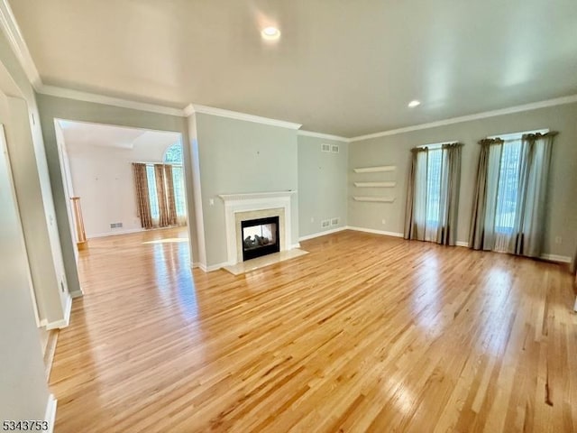 20 Tonnelier Way, Denville Twp, NJ 07834 - unfurnished living room with light wood-style floors, a multi sided fireplace, ornamental molding, and recessed lighting