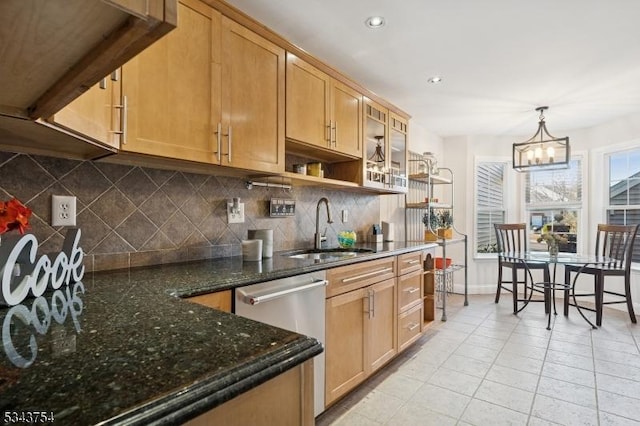 kitchen with a sink, open shelves, tasteful backsplash, stainless steel dishwasher, and a chandelier