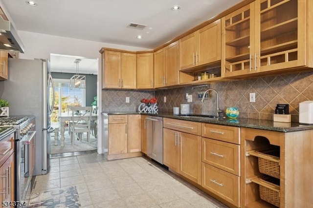 kitchen featuring visible vents, open shelves, a sink, stainless steel appliances, and wall chimney exhaust hood