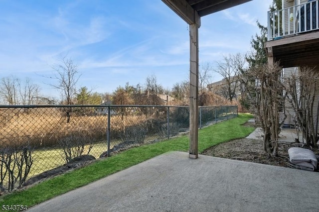 view of patio / terrace featuring fence