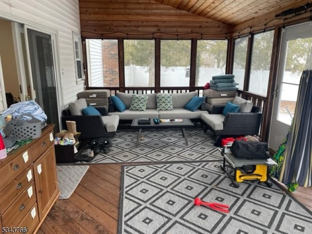 sunroom / solarium with wood ceiling and vaulted ceiling