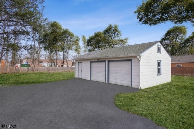 detached garage with fence