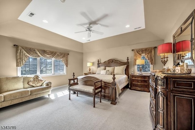 bedroom with recessed lighting, visible vents, and light colored carpet