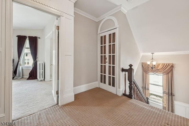 7 High St, Stanhope Boro, NJ 07874 - hall featuring radiator, a chandelier, carpet floors, an upstairs landing, and crown molding
