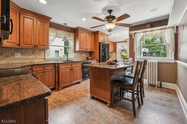 7 High St, Stanhope Boro, NJ 07874 - kitchen featuring black appliances, a sink, healthy amount of natural light, brown cabinets, and recessed lighting