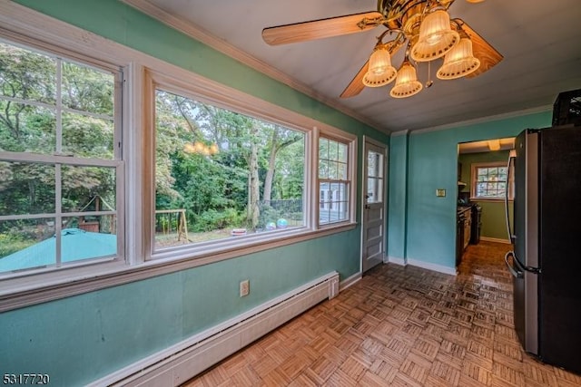 interior space featuring baseboards, baseboard heating, an inviting chandelier, and ornamental molding