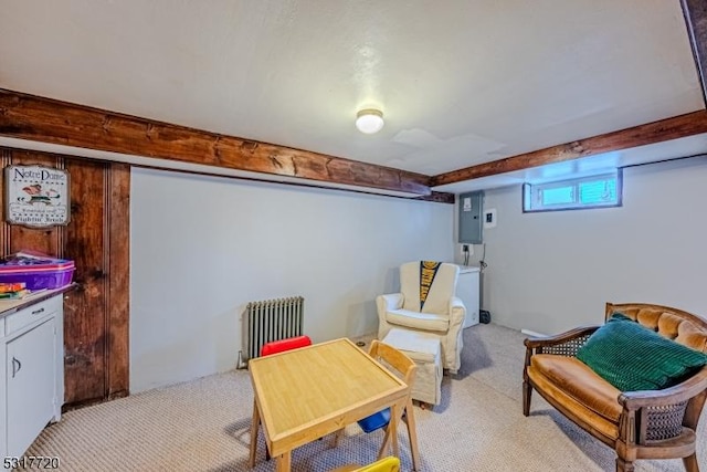 interior space with electric panel, beamed ceiling, light colored carpet, and radiator heating unit