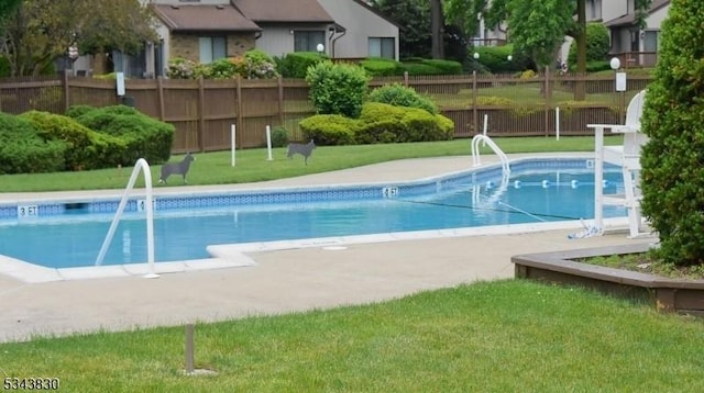 pool featuring fence