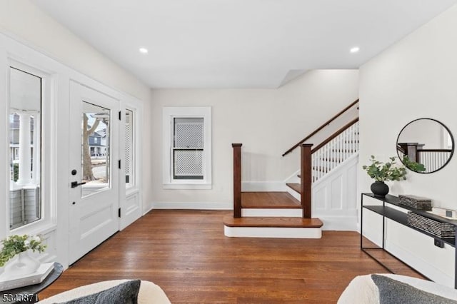 entrance foyer featuring recessed lighting, stairs, baseboards, and wood finished floors