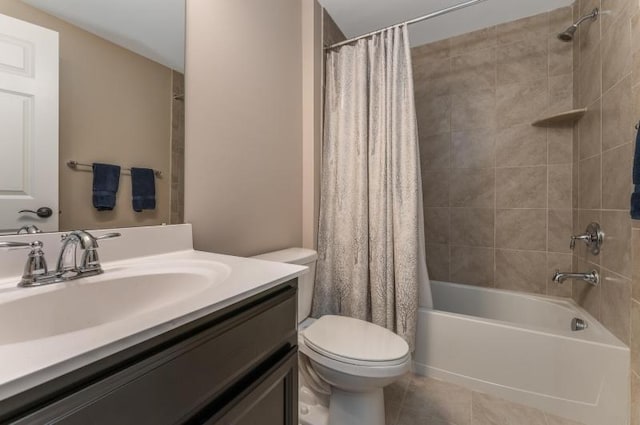 bathroom featuring tile patterned flooring, shower / bath combination with curtain, toilet, and vanity