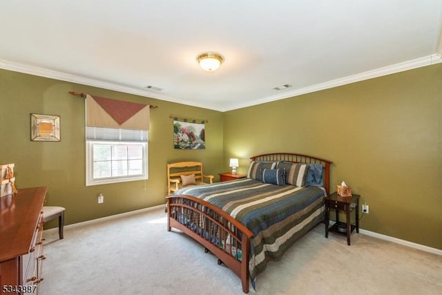 bedroom featuring visible vents, light carpet, baseboards, and ornamental molding