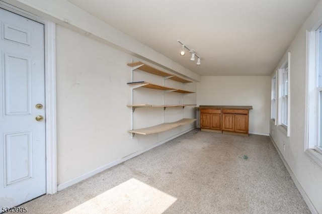 empty room featuring baseboards