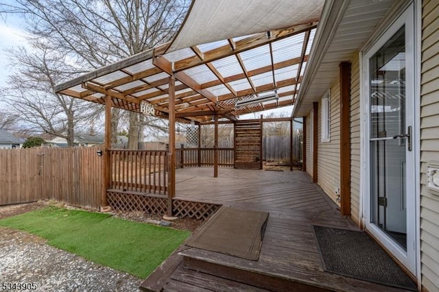 deck with a pergola and fence