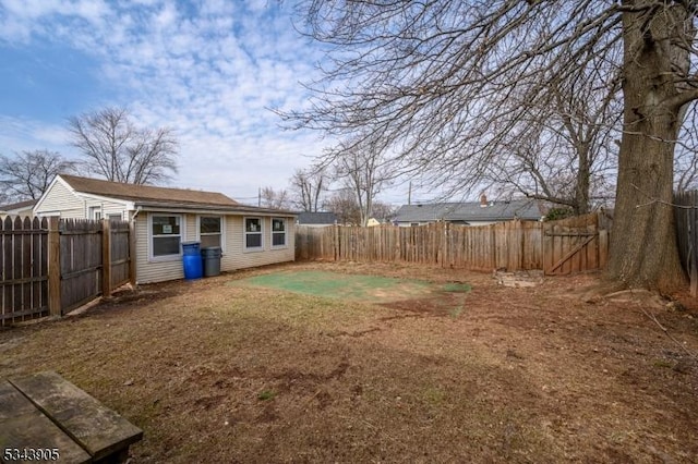 view of yard featuring a fenced backyard