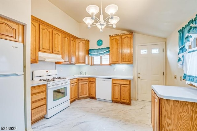 kitchen featuring under cabinet range hood, light countertops, vaulted ceiling, marble finish floor, and white appliances